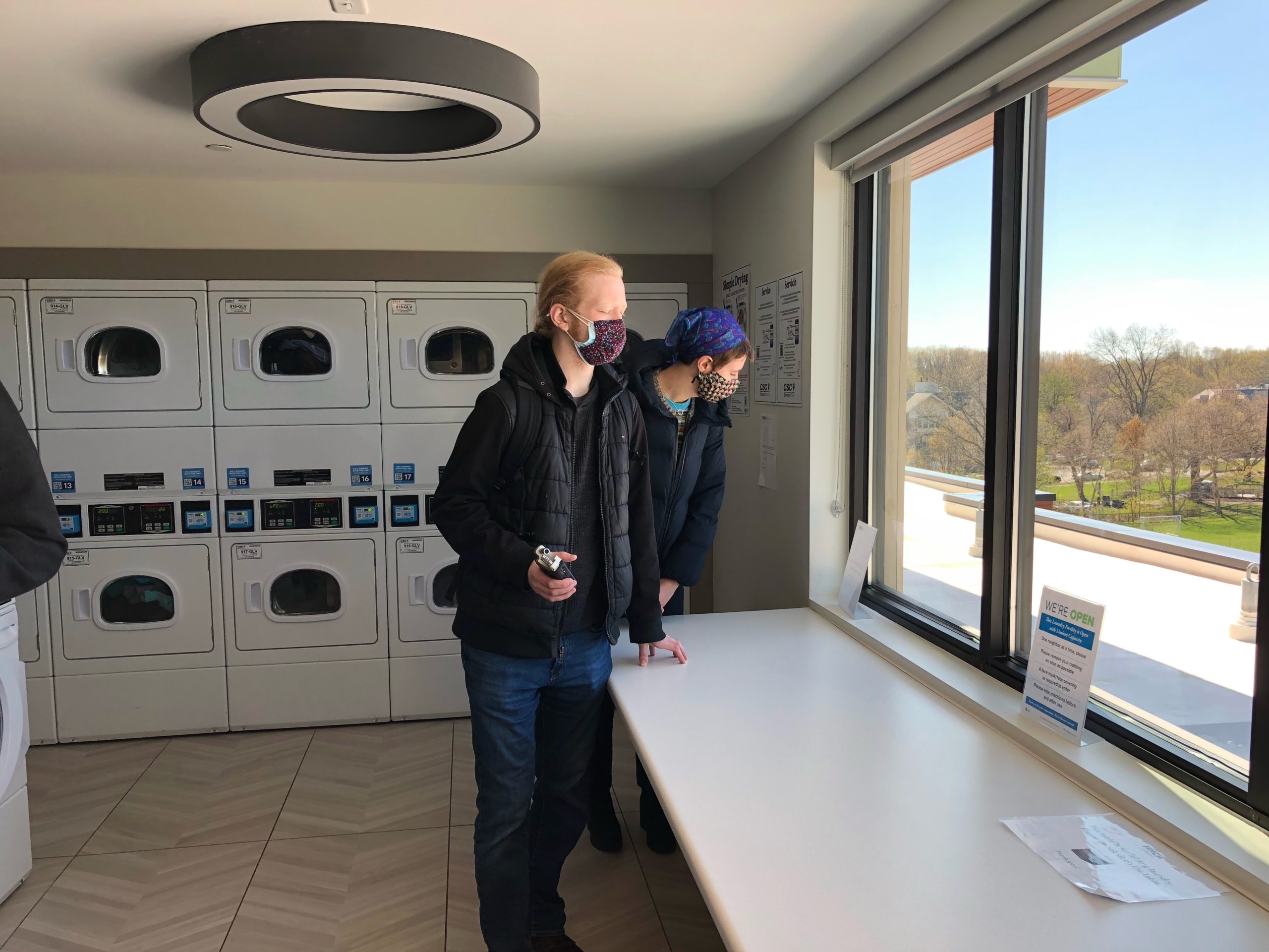 Carl-Isaak and Klara check out the views from the laundry room